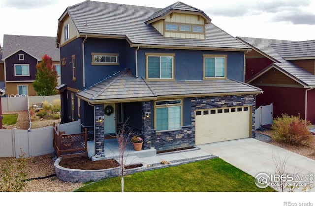 185 Pipit Lake Way, Erie, CO 80516 - craftsman inspired home with driveway, an attached garage, covered porch, and stucco siding
