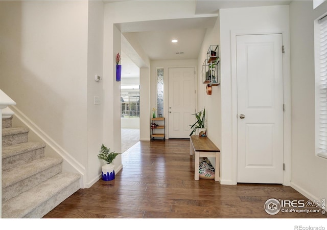 185 Pipit Lake Way, Erie, CO 80516 - foyer featuring wood finished floors, stairs, baseboards, and recessed lighting