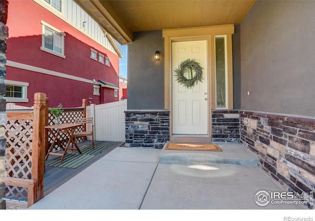 185 Pipit Lake Way, Erie, CO 80516 - property entrance with stone siding and stucco siding