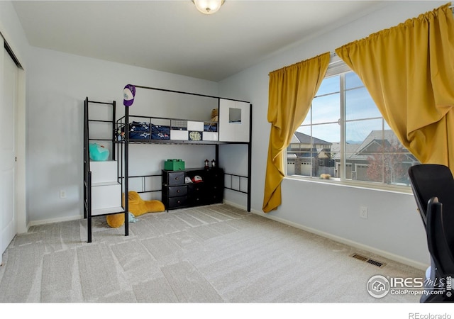 bedroom featuring carpet flooring