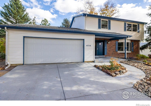 front of property featuring a garage