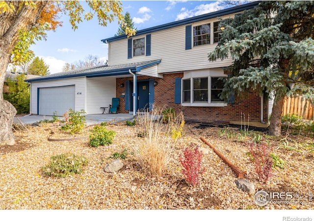 view of front property with a garage