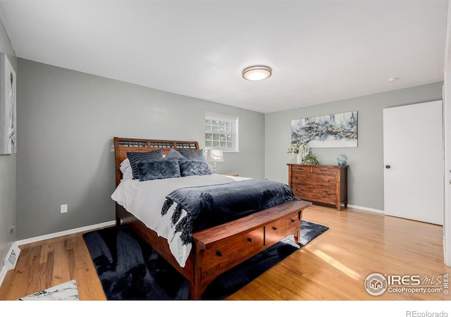 bedroom featuring light wood-type flooring