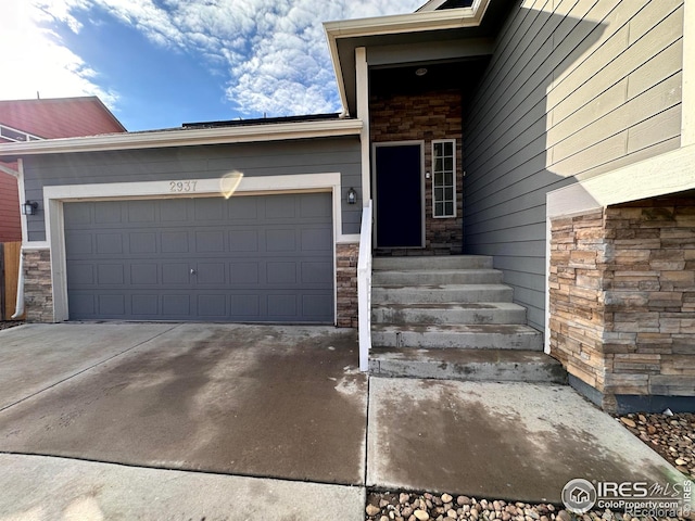 property entrance featuring a garage