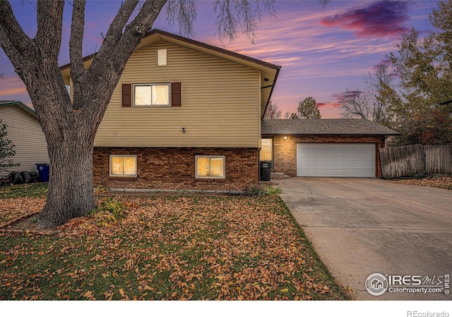 view of front of home with a garage