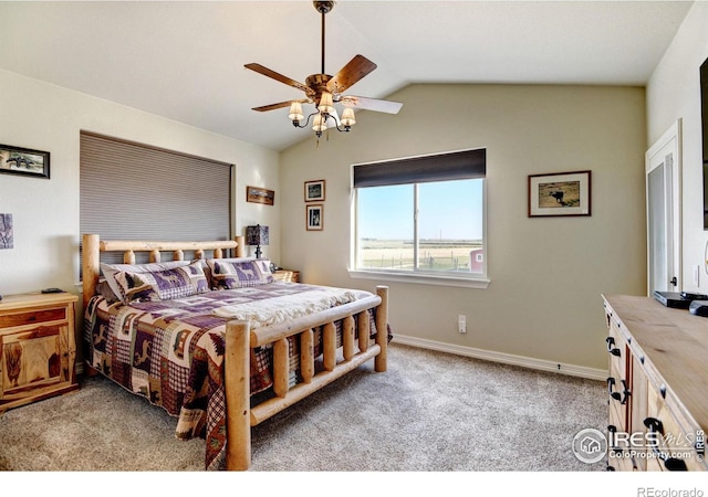 bedroom featuring lofted ceiling, light colored carpet, and ceiling fan