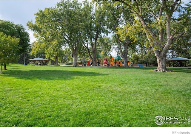 view of yard with a playground and a gazebo