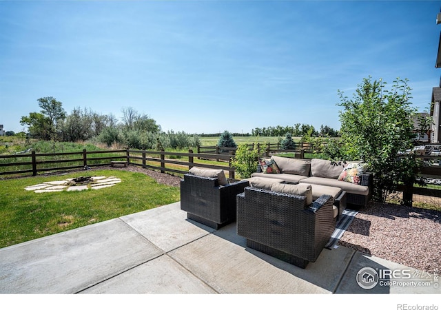 view of patio / terrace featuring a rural view