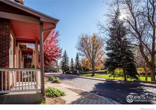 818 S Terry St Unit 85, Longmont, CO 80501 - view of wooden porch