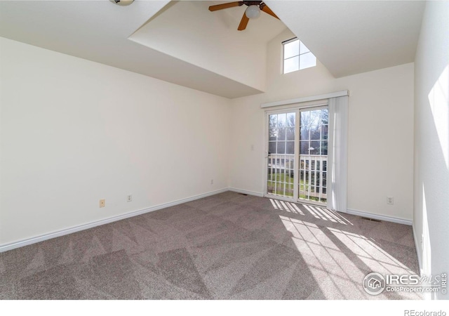 818 S Terry St Unit 85, Longmont, CO 80501 - carpeted empty room featuring a ceiling fan, high vaulted ceiling, and baseboards