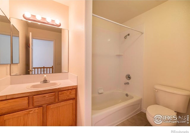 818 S Terry St Unit 85, Longmont, CO 80501 - bathroom featuring toilet,  shower combination, tile patterned flooring, and vanity
