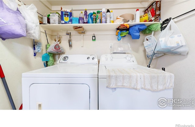 laundry room with washer and clothes dryer