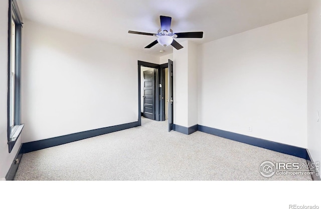 spare room featuring ceiling fan