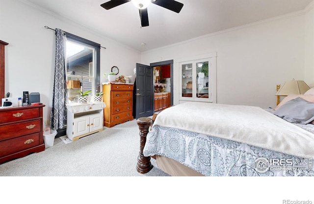 bedroom featuring multiple windows, ceiling fan, ornamental molding, and light carpet