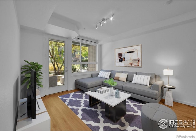 living room with light hardwood / wood-style floors