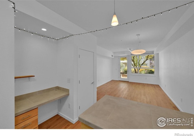 interior space with light hardwood / wood-style flooring