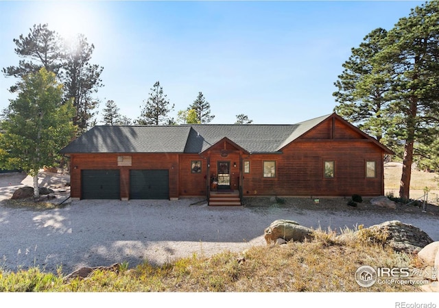 view of front of property featuring a garage