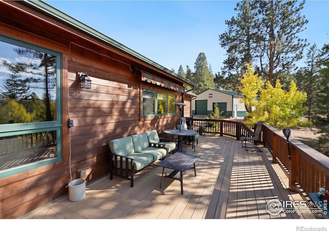 deck with outdoor lounge area