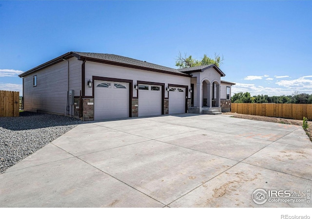 view of front of home featuring a garage