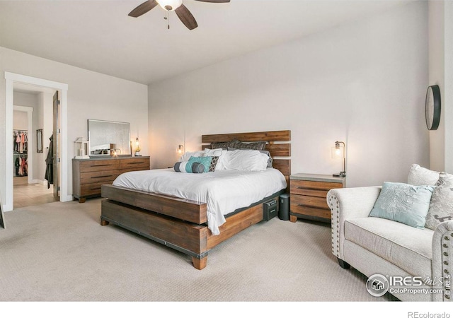 bedroom with light colored carpet and ceiling fan