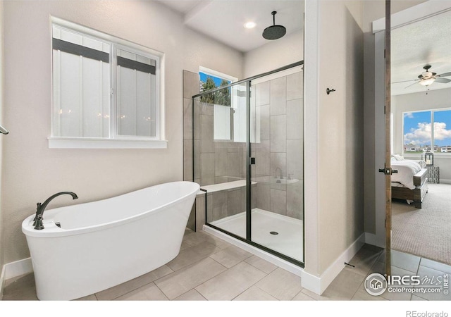 bathroom with tile patterned floors, ceiling fan, and separate shower and tub