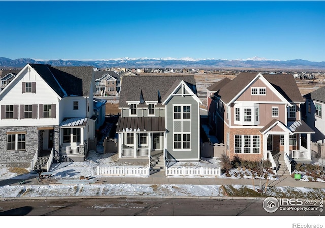 view of front of house featuring a mountain view