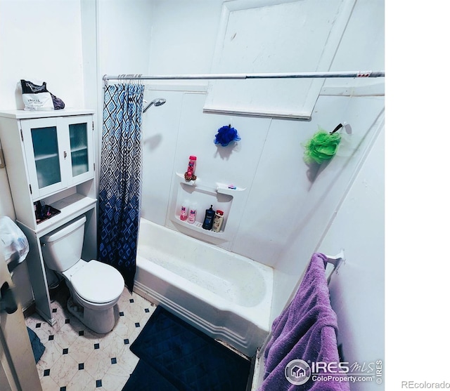 full bathroom with toilet and shower / tub combo with curtain