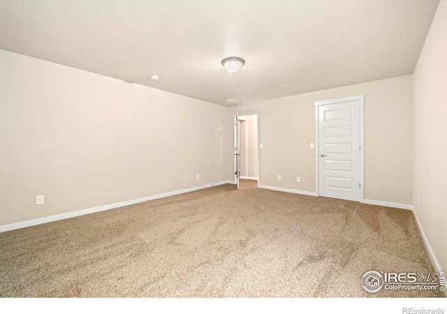 unfurnished room featuring carpet flooring