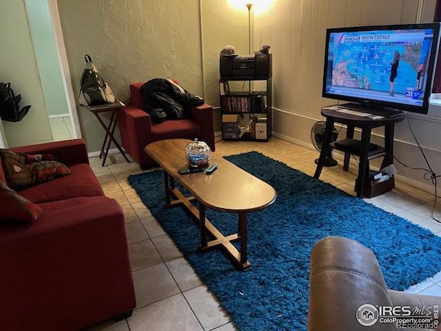 living room featuring tile patterned flooring