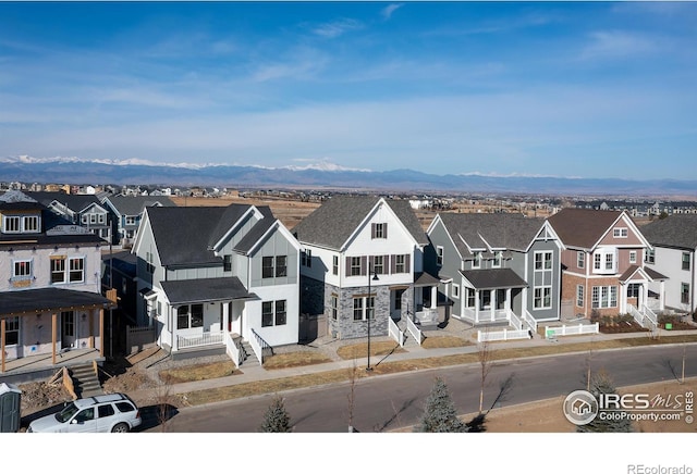 view of front facade featuring a mountain view