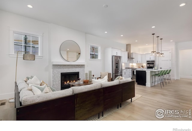 living room featuring light hardwood / wood-style flooring