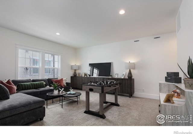 living room with light colored carpet