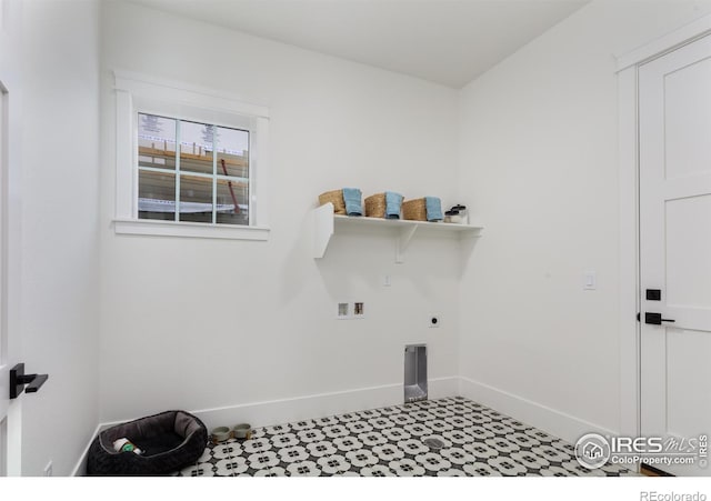 laundry room with hookup for an electric dryer and hookup for a washing machine