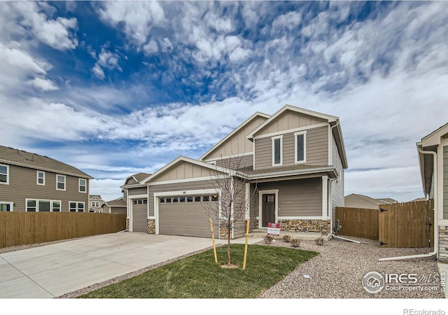 craftsman-style home with a garage