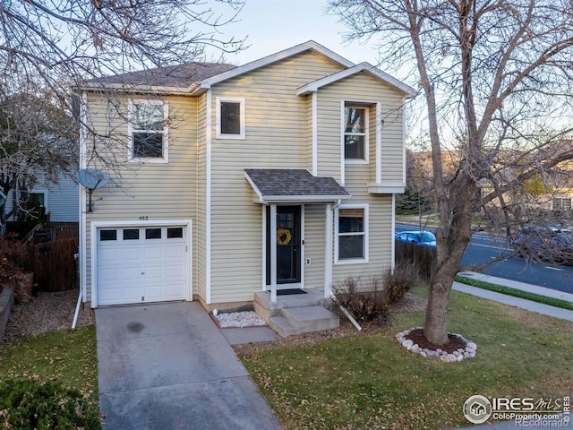 front of property with a garage