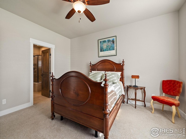 carpeted bedroom with ceiling fan and baseboards