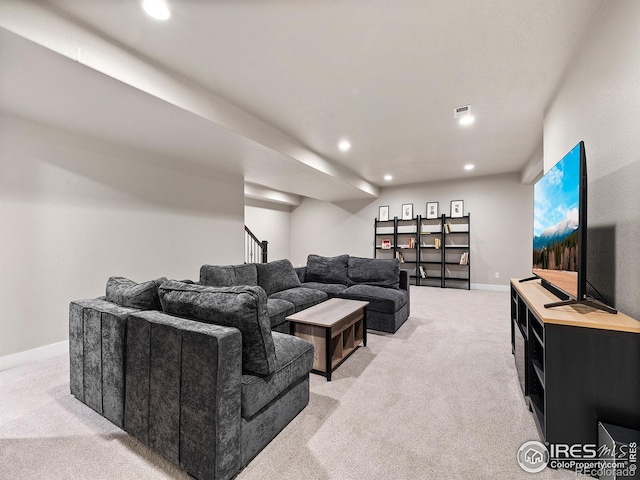 living room with recessed lighting, light carpet, visible vents, baseboards, and stairway