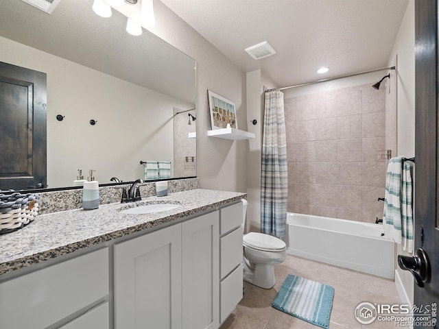 full bathroom featuring shower / tub combo, visible vents, toilet, tile patterned flooring, and vanity