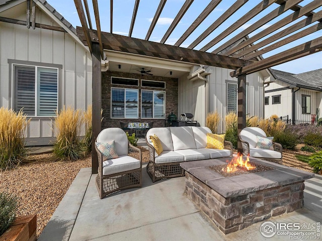 view of patio featuring a ceiling fan, a pergola, and an outdoor living space with a fire pit