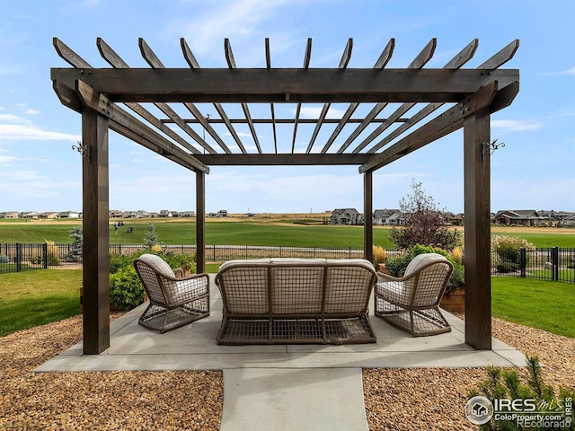 view of patio / terrace with an outdoor hangout area, a fenced backyard, and a pergola