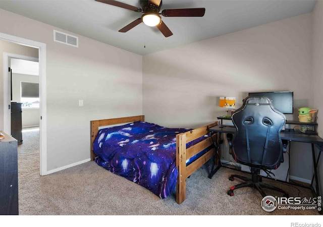 bedroom featuring ceiling fan and carpet floors