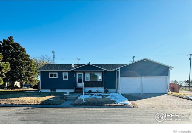 single story home featuring a garage