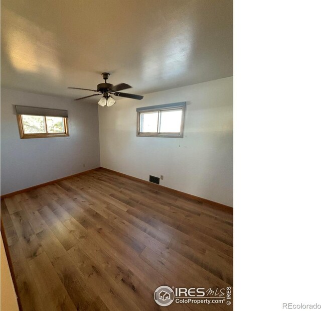 180 W 3rd St S, Cheyenne Wells, CO 80810 - empty room featuring ceiling fan and wood finished floors
