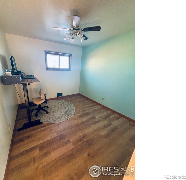 180 W 3rd St S, Cheyenne Wells, CO 80810 - office with wood finished floors and a ceiling fan