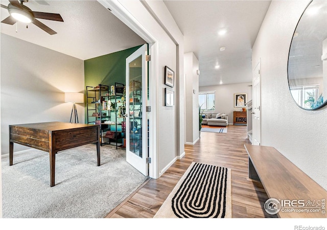 hallway featuring light wood-type flooring