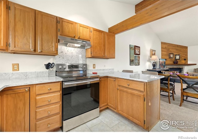 kitchen with kitchen peninsula, light stone countertops, light tile patterned floors, a fireplace, and stainless steel electric range