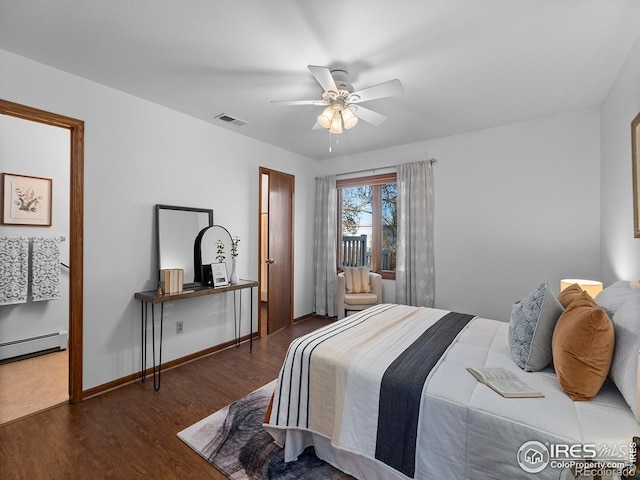 bedroom with dark wood-type flooring and ceiling fan