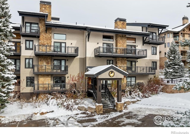 view of snow covered property