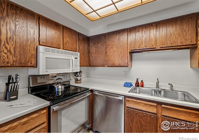 kitchen featuring stainless steel appliances and sink