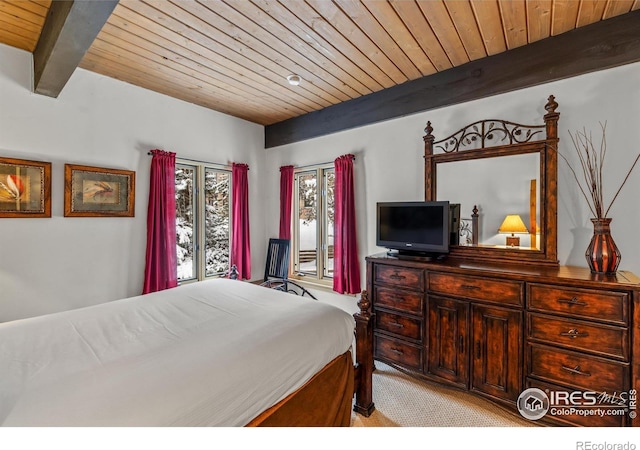 bedroom with wooden ceiling, beam ceiling, and light carpet